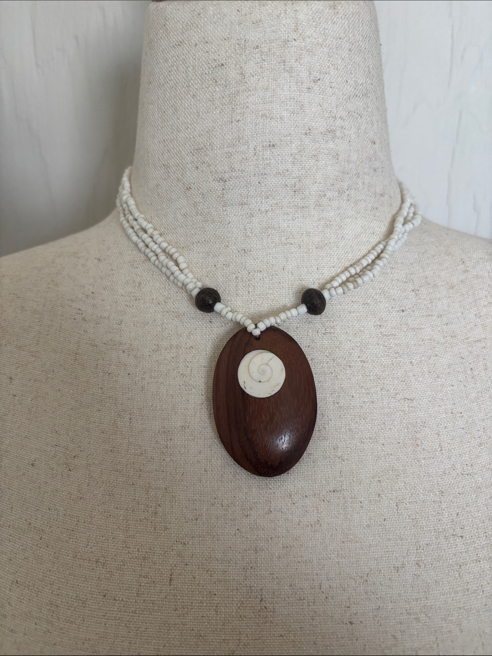 Handcrafted White Beaded Necklace with Wooden Pendant